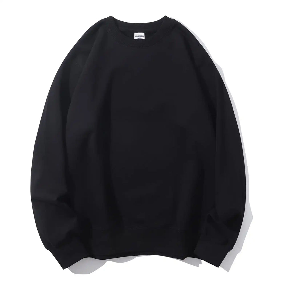 Black crewneck flat lay